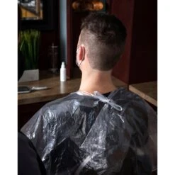 SUN® Disposable Plastic Client Cape, 51"W X 63"L , 50 Pack -Makeup Care Products Store 1 clipped rev 1 30ec3463 978b 47ff 880a 3562dc6f80c3